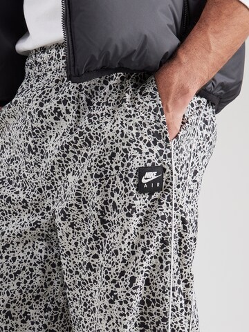 Nike Sportswear Zúžený Kalhoty 'AIR' – béžová