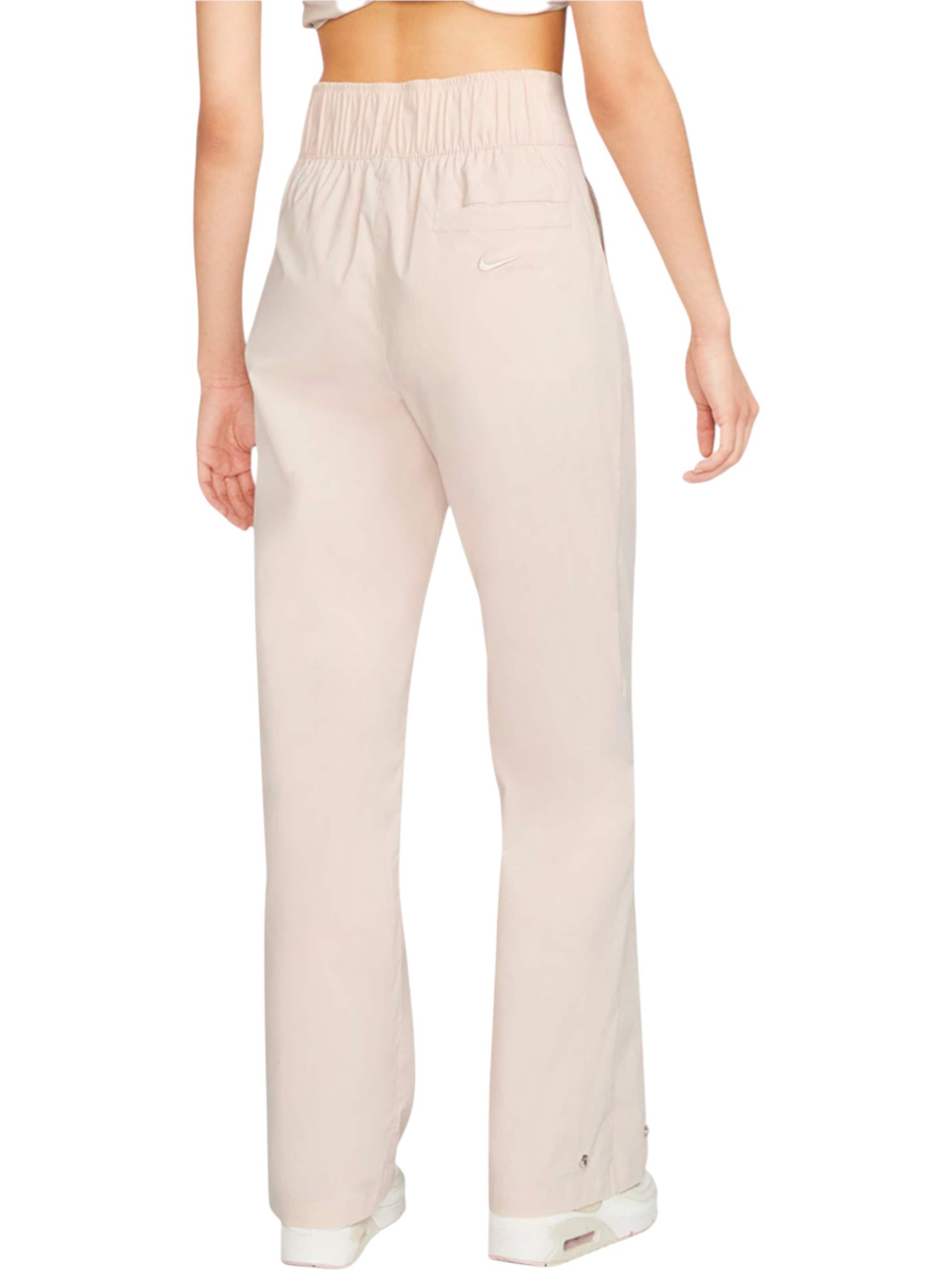 Nike Sportswear Wide leg Pleat-front trousers in Pink