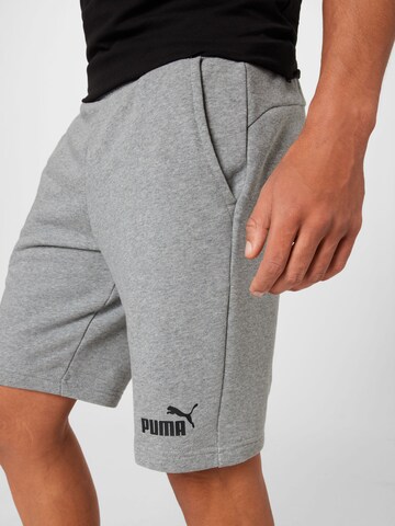 PUMA Обычный Спортивные штаны в Серый