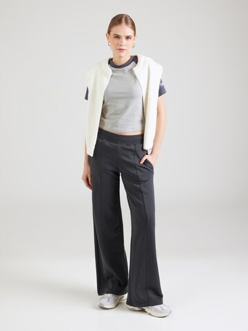 Wide leg Pantaloni di Champion Authentic Athletic Apparel in grigio