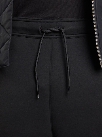 WEEKDAY Loose fit Trousers in Black