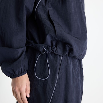 Giacca sportiva 'Sport Legacy Jacket' di new balance in blu