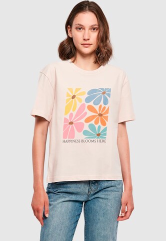 Merchcode T-Shirt 'Happiness Blooms Here' in Pink: Vorderseite