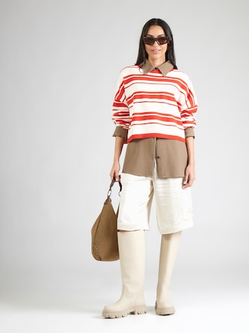 Pull-over oversize & Other Stories en rouge