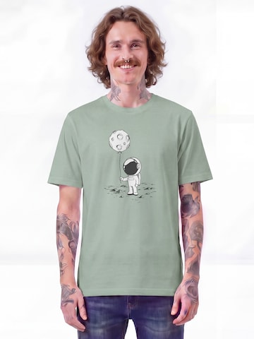 T-Shirt 'Kleiner Astronaut Mit Luftballon' Watapparel en vert : devant