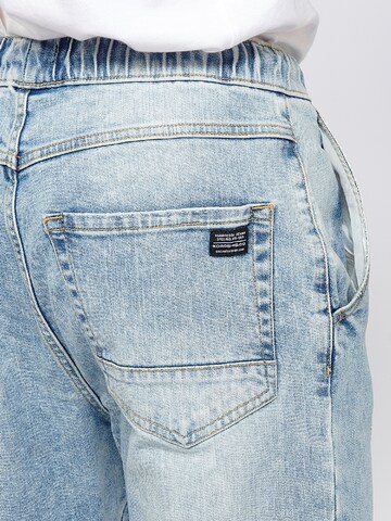 Tapered Jeans di KOROSHI in blu