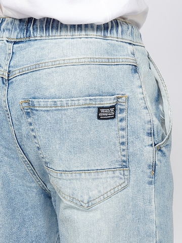 KOROSHI Tapered Jeans in Blauw