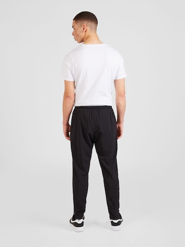 Champion Authentic Athletic Apparel - regular Pantalón deportivo en negro