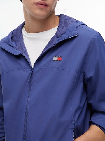 Tommy Jeans Tussenjas 'CHICAGO' in Blauw