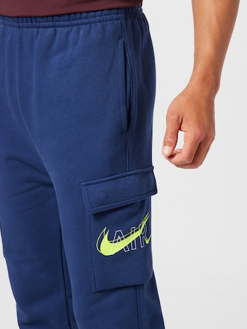 Nike Sportswear Дънки Tapered Leg Карго панталон в синьо