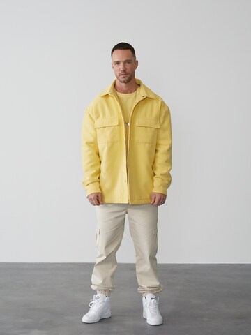 DAN FOX APPAREL Regular fit Between-Season Jacket 'Mick' in Yellow