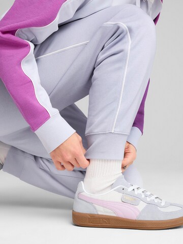 PUMA Tapered Sports trousers in Blue