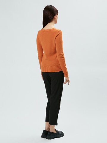 Pullover di Influencer in arancione