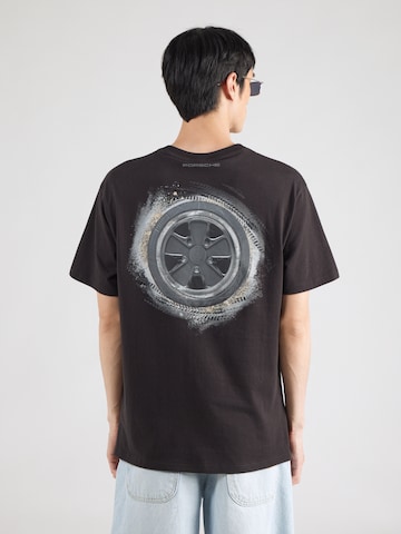 Tricou 'PL' de la PUMA pe negru: față