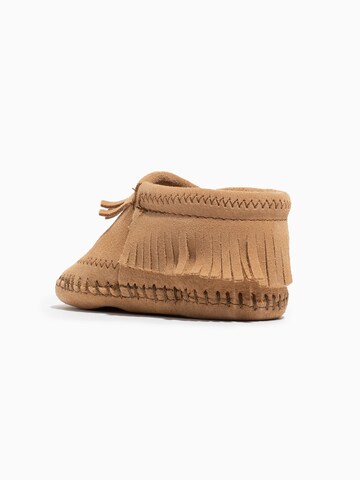 Stivale 'Riley' di Minnetonka in beige