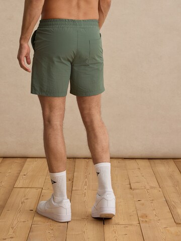 DAN FOX APPARELKupaće hlače 'Laurin' - zelena boja