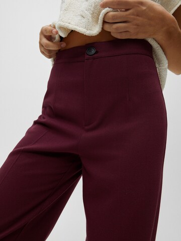 Pull&Bear Loosefit Kalhoty s puky – červená