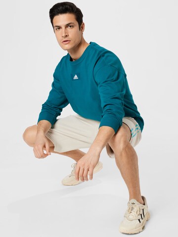 ADIDAS SPORTSWEAR Sport sweatshirt i blå