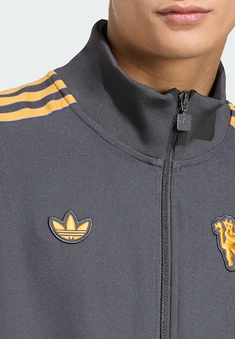 ADIDAS ORIGINALS Sweatjacke 'Manchester United Terrace Icons' in Schwarz
