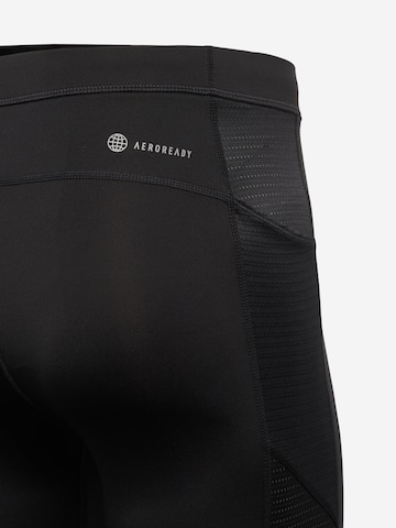 Skinny Pantalon de sport 'Own The Run' ADIDAS PERFORMANCE en noir