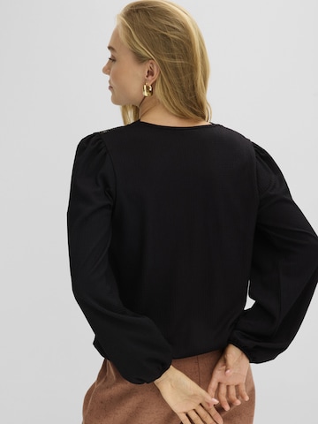 bonprix - Blusa en negro