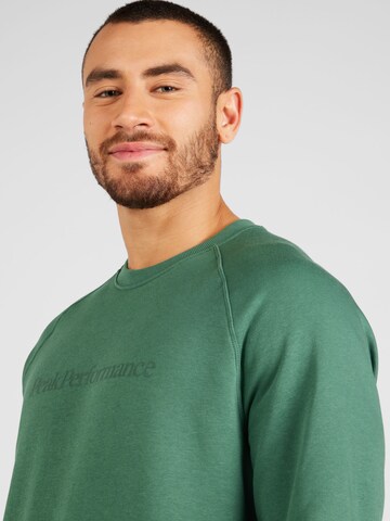 PEAK PERFORMANCE - Sweatshirt de desporto em verde