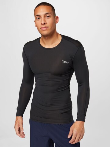 T-Shirt fonctionnel Reebok en noir : devant