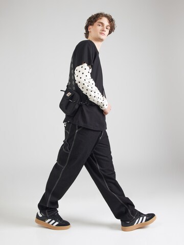 Carhartt WIP Широка кройка Дънки 'Single Knee' в черно