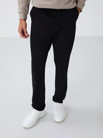 Tommy Life Regular Workout Pants 'Jogginghose' in Black