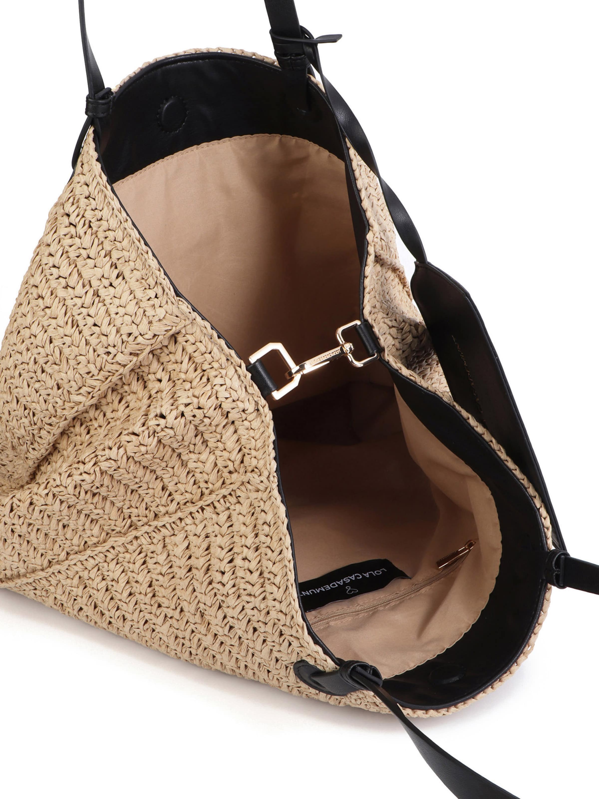 Lola Casademunt Rannakott, värv pruun