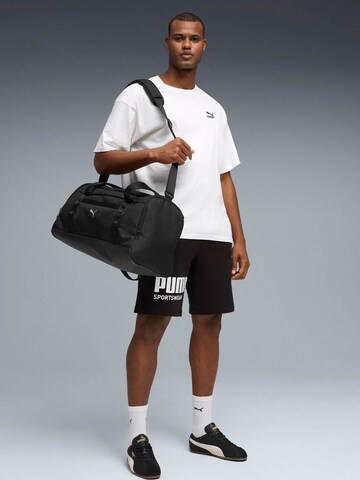 PUMA - regular Pantalón deportivo 'Puma Sport Graphic Shorts Tr' en negro