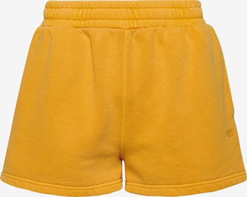 Superdry Pants in Yellow: front