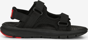 PUMA Sandals & Slippers 'Evolve' in Black