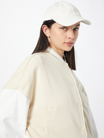 Veste mi-saison Urban Classics en beige