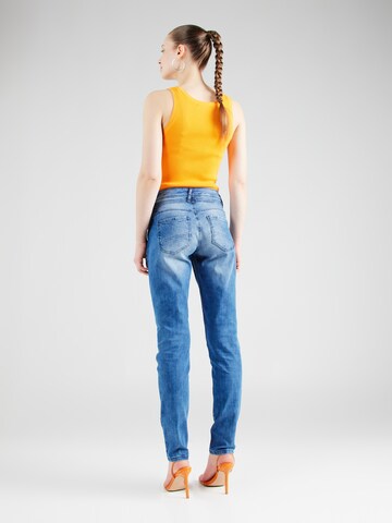 Coupe slim Jean Cartoon en bleu