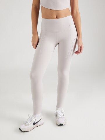 NIKE Skinny Workout Pants 'GO' in Purple: front