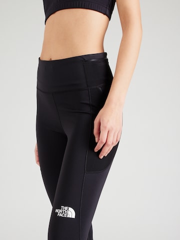 THE NORTH FACE - Skinny Calças de desporto 'MOVMYNT' em preto