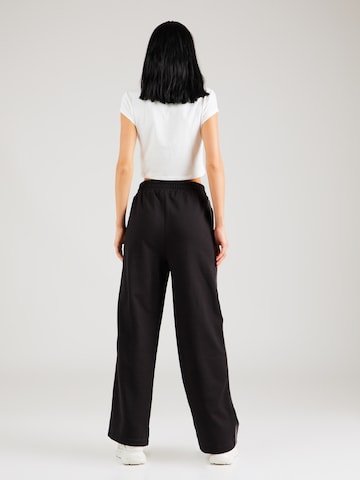 ABOUT YOU x Chiara Biasi Loose fit Pants 'Gesa' in Black