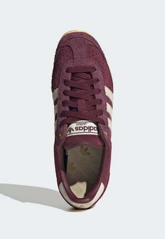 Baskets basses ADIDAS ORIGINALS en rouge