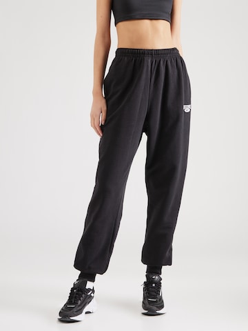 Effilé Pantalon de sport Reebok en noir : devant