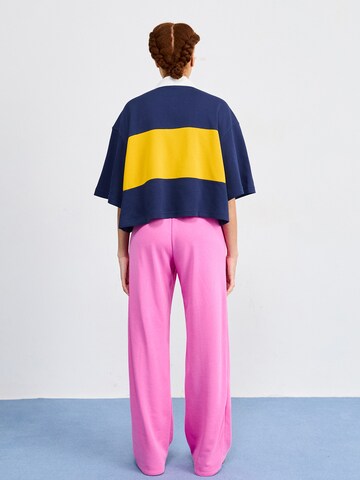 Nike Sportswear Wide Leg Bukser 'CHLL' i pink: tilbage