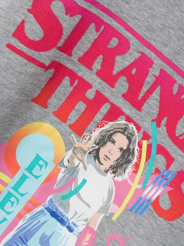 T-Shirt 'Stranger Things' NAME IT en gris