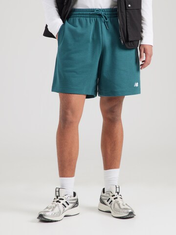 Regular Pantalon 'Essentials' new balance en bleu : devant