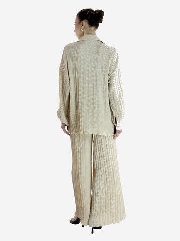 Elara Buksedragt i beige