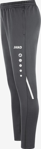 Tapered Pantaloni sportivi 'Challenge' di JAKO in grigio