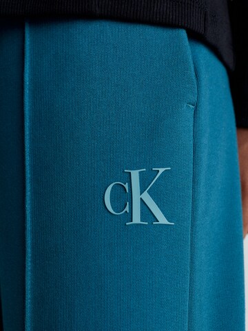 Calvin Klein Jeans Wide Leg Hose in Blau