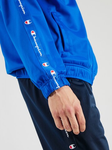 Champion Authentic Athletic Apparel Trainingspak in Blauw