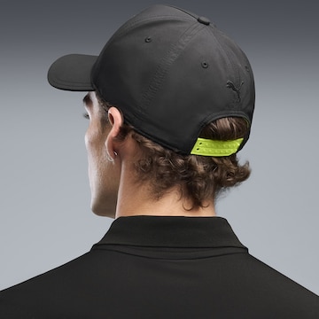 PUMA Sports cap 'PUMA x ASTON MARTIN ARAMCO F1® TEAM' in Black