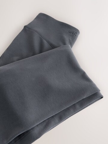 self. Flared Hose in Blau