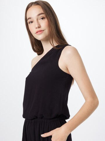 Tuta jumpsuit di DKNY in nero